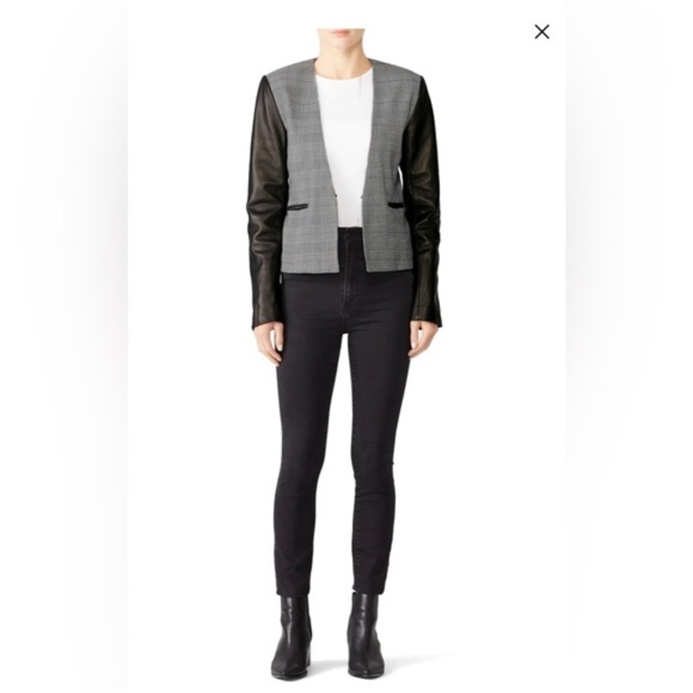 Veda large leather sleeve smoke jacket.